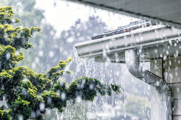 Photo of gutters under a heavy downpour - Getty Images/iStockphotos